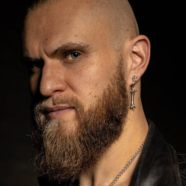 Ben Poole Wearing Bone Earrings - Black Feather Design